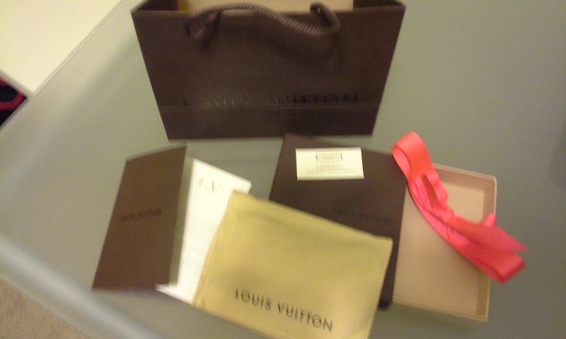 Can't sell Louis Vuitton shopping bags, dust pouches, boxes on .